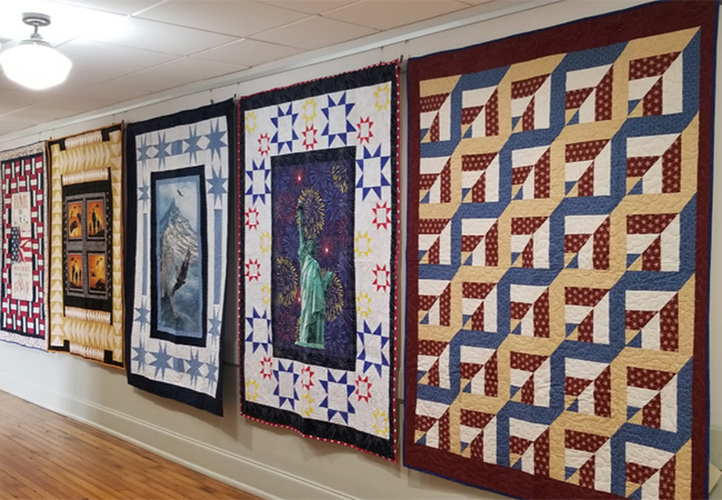 Horry Count Museum - Quilt Gala - quilts hanging for display
