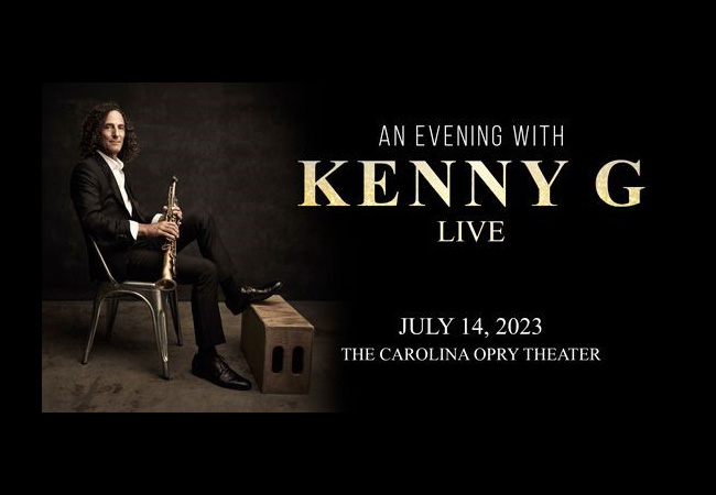 Kenny G sitting with saxophone