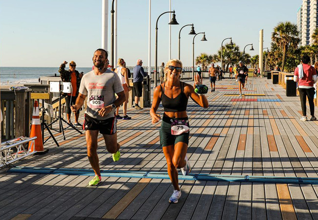 Marathon runners on the Myrtle Beach Boardwalk