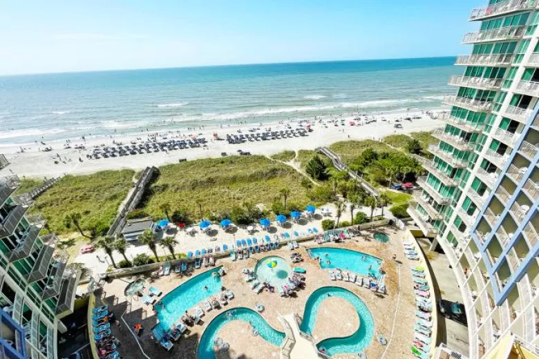 View of the Avista Resort swimming pool and oceanfront 