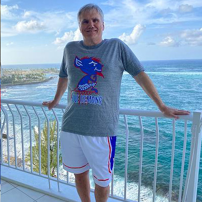 UFB DePaul Fan in shirt and shorts at beach