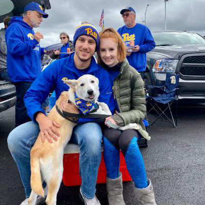 UFB Pitt fans tailgating with Pitt pup