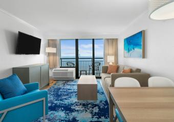 Caribbean Resort Oceanfront 1 Bedroom King Suite Living Room Photo