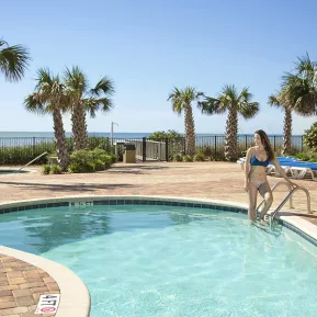 Palace Resort woman in oceanfront pool