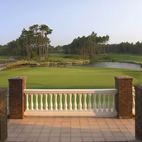 Lion's Paw view from clubhouse balcony greens with lake