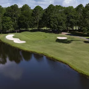 Sea Trail Jones Course aerial with fairway, green and water feature