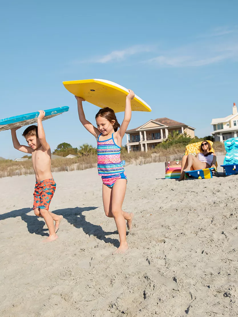 Family with boogie boards