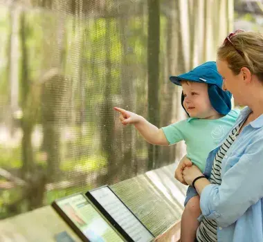 Child and Mom looking at animals at Lowcountry Zoo