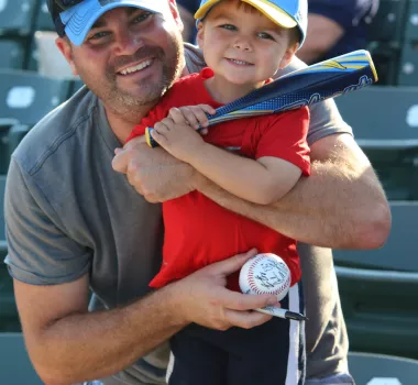 Baseball family at Pelicans game