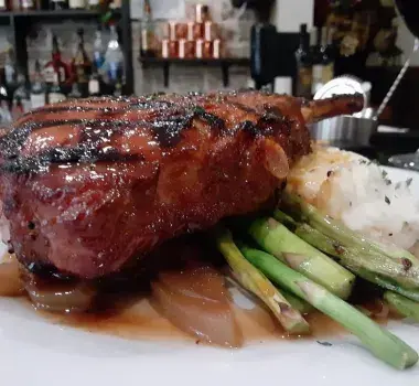 Steak with potatos and asparagus at 42nd Street Bar and Grill