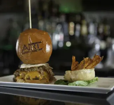 Cheeseburger and fries on display