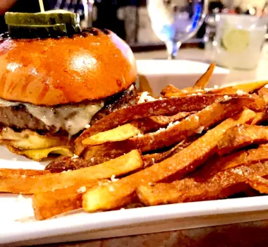 Fire and Smoke Cheeseburger and fries on display