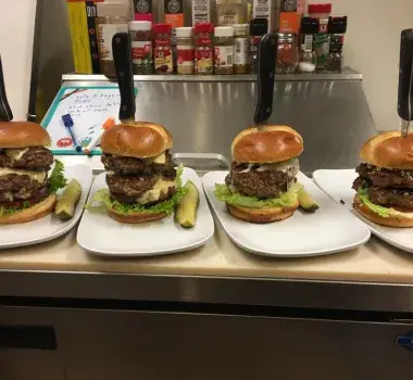 Cheeseburger and fries on display
