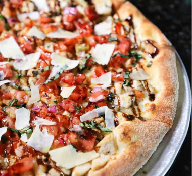 hot_tomato.jpg Pizza on display