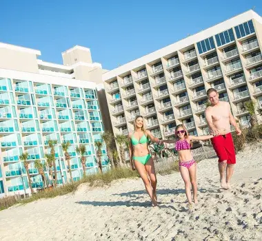 Captain's Quarters family on resort beach