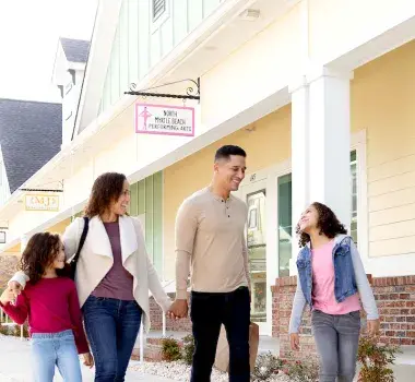 Family walking and shopping in the winter in Myrtle Beach