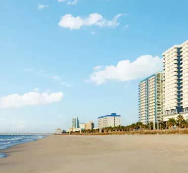 Homewood Suites by Hilton beachfront with buildings