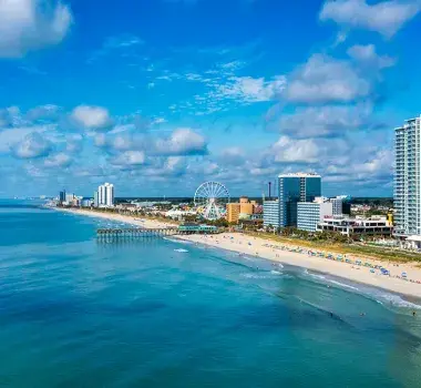 Shoreline with SkyWheel and blue ocean