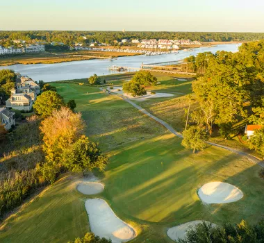 Tidewater Golf Club with fairway, green and Intracoastal Waterway