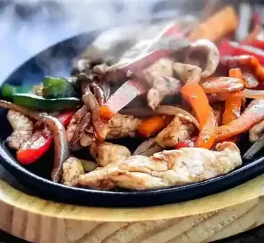 Fajitas on a dish at Chile Frito