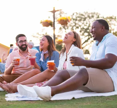 Friends enjoying beverage at Crooked Hammock
