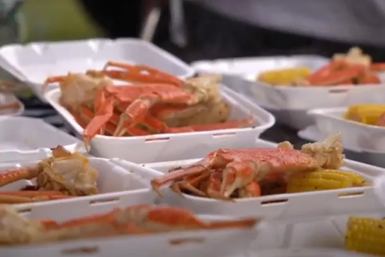 I Love Seafood Fest crab legs and corn on the cob in to go trays