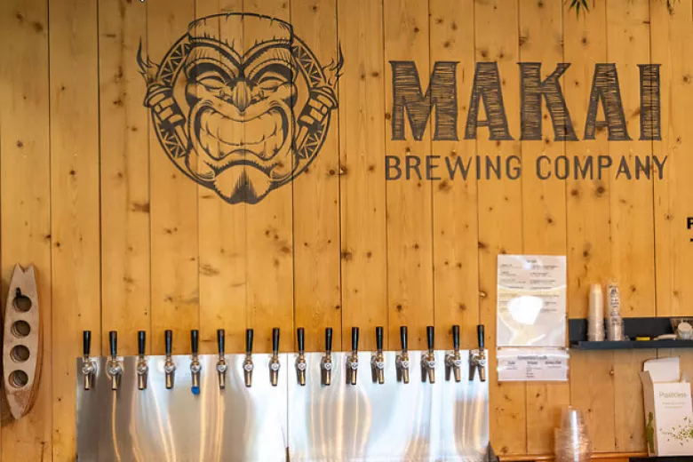 Makai Brewing entry wall with logo