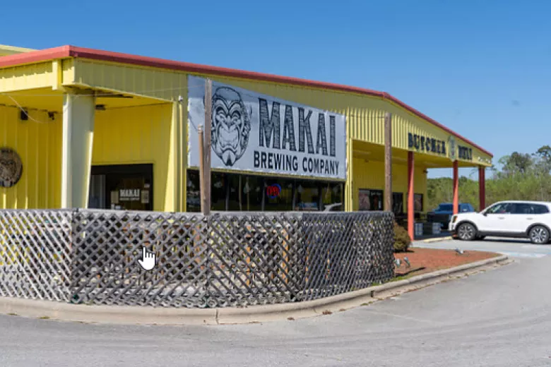 Makai Brewing exterior with outdoor sitting area