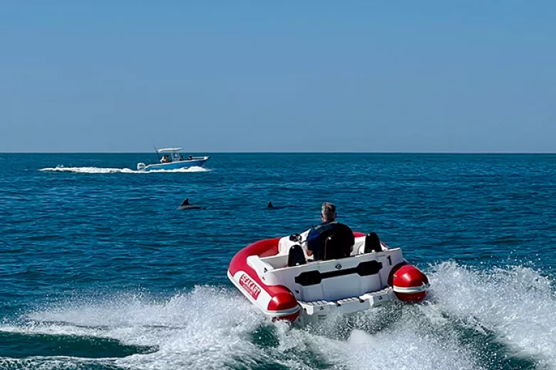 Seakart Adventure man in seakart on dolphin tour on ocean