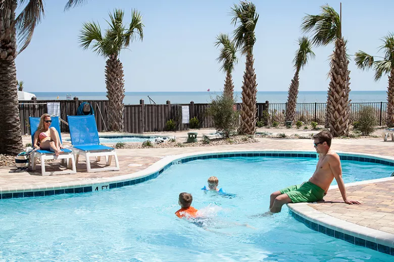 Palace Resort family at oceanfront pool