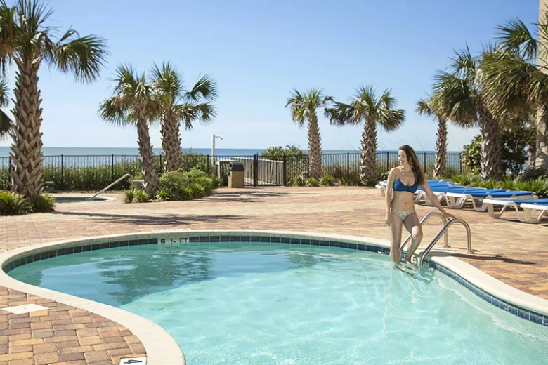 Palace Resort woman in oceanfront pool