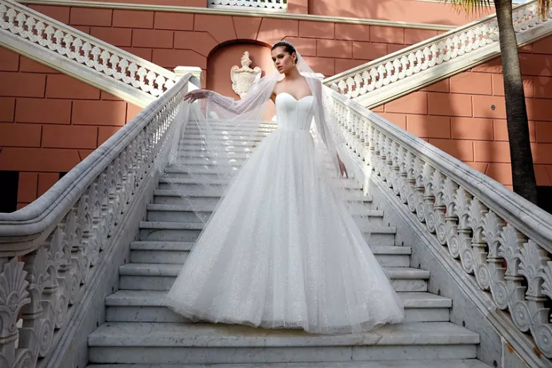 Two Oaks bride on outdoor grand stairs