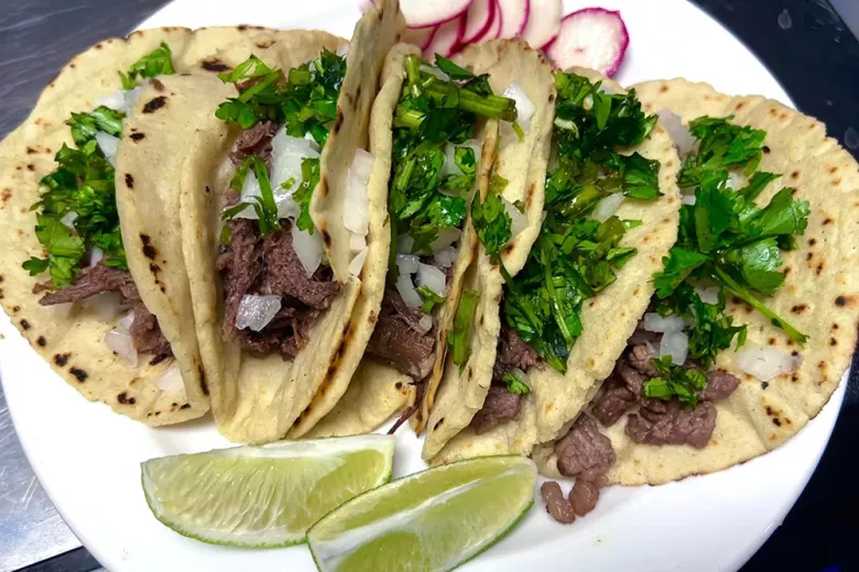 Delia's Kitchen steak tacos with fresh cilantro