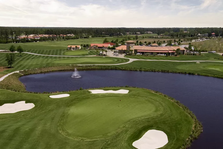 Grande Dunes aerial with clubhouse, green and lake