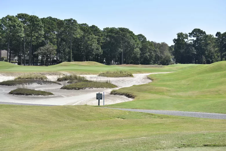 Prestwick Country Club rolling greens with sandtrap