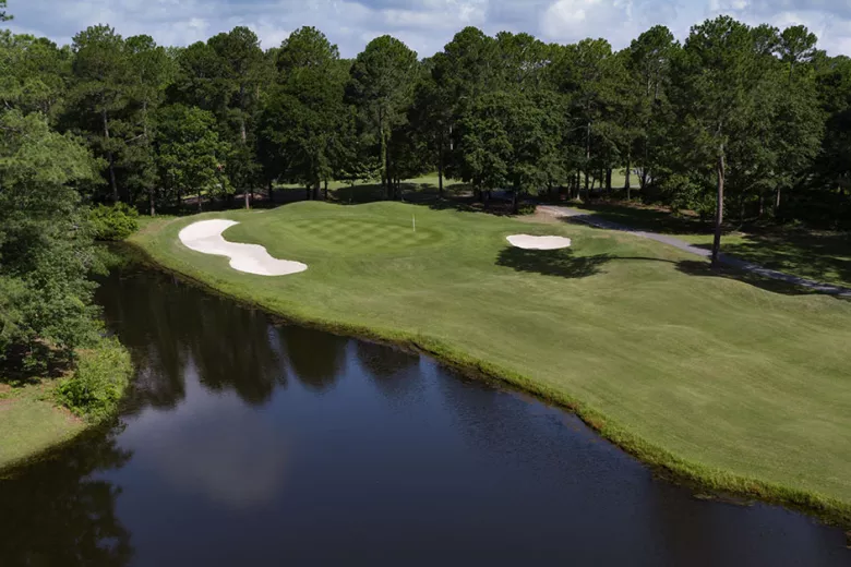 Sea Trail Jones Course aerial with fairway, green and water feature