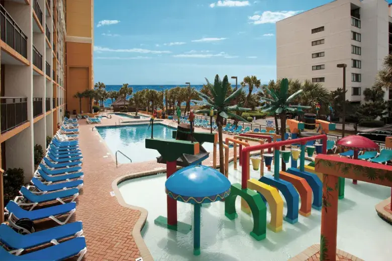 Caravelle Resort Block-Long Poolscape