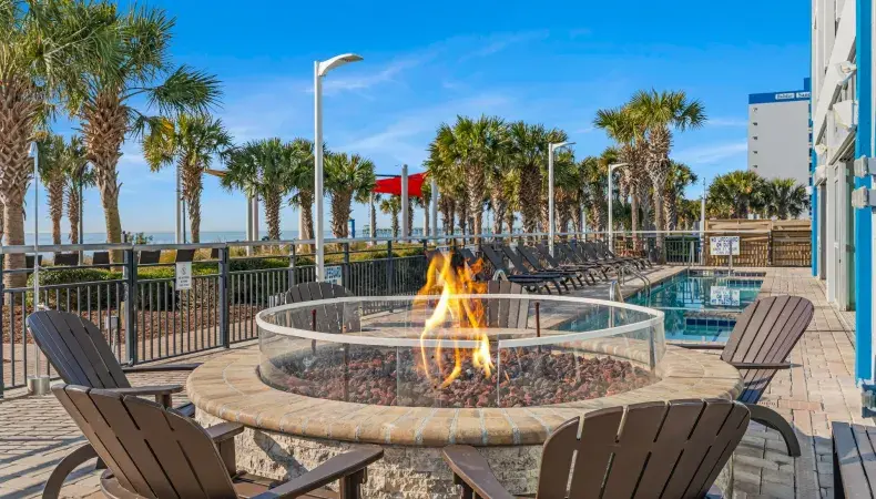 Oceanfront fire pit seating area Photo 17