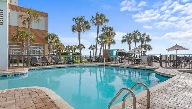 Beachfront pool area Photo 10