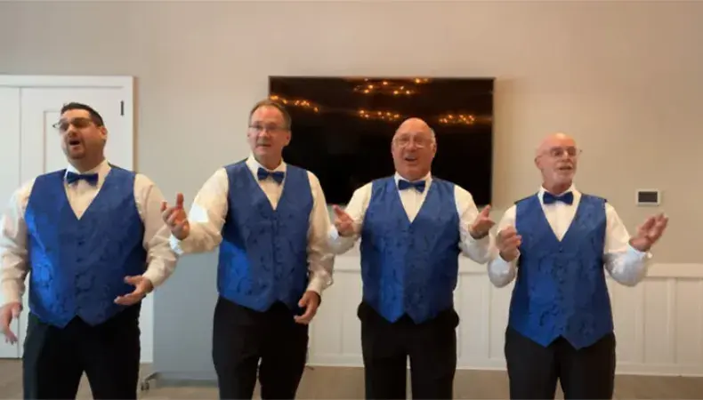 The Overtones barbershop quartet performing