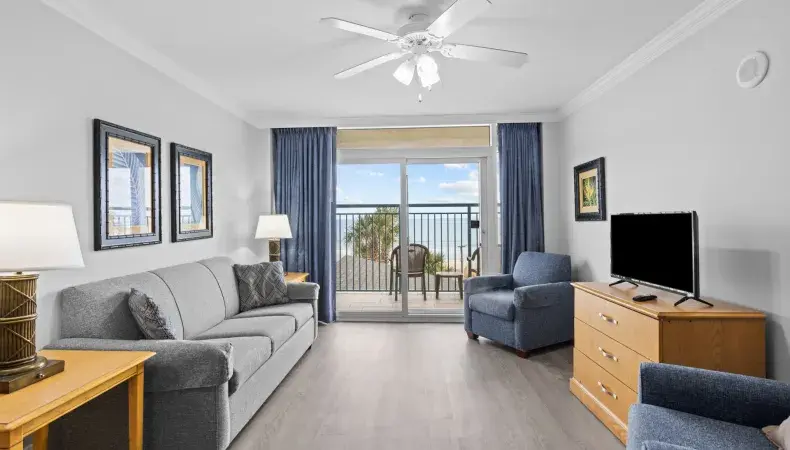 Oceanfront living room with balcony Photo 9