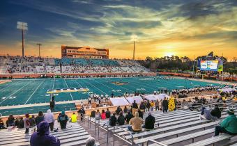 Football Bowl Game at sunset