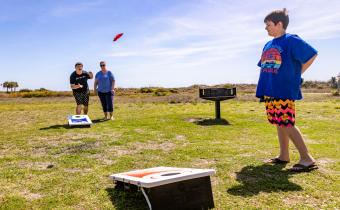 Sensory-Friendly Travel: Cornhole at Myrtle Beach State Park