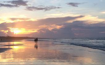 Sunrise walk on the beach