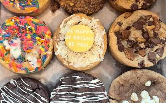 A variety of cookies and cakes with sprinkles, chocolate chips and drizzles