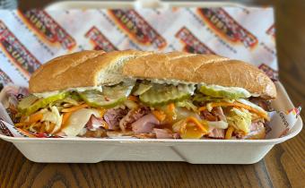 Firehouse sub in a to-go container