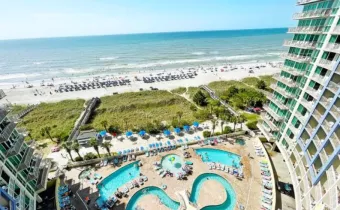 View of the Avista Resort swimming pool and oceanfront 