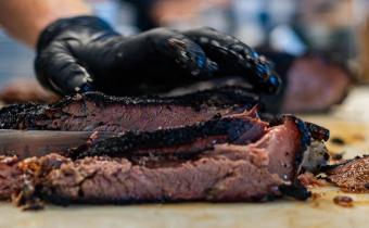 Fullybelly BBQ cutting brisket