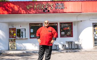 Mike Chestnut in front of Big Mike's Soul Food