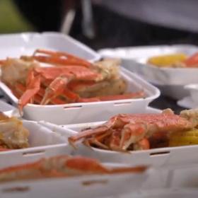 I Love Seafood Fest crab legs and corn on the cob in to go trays